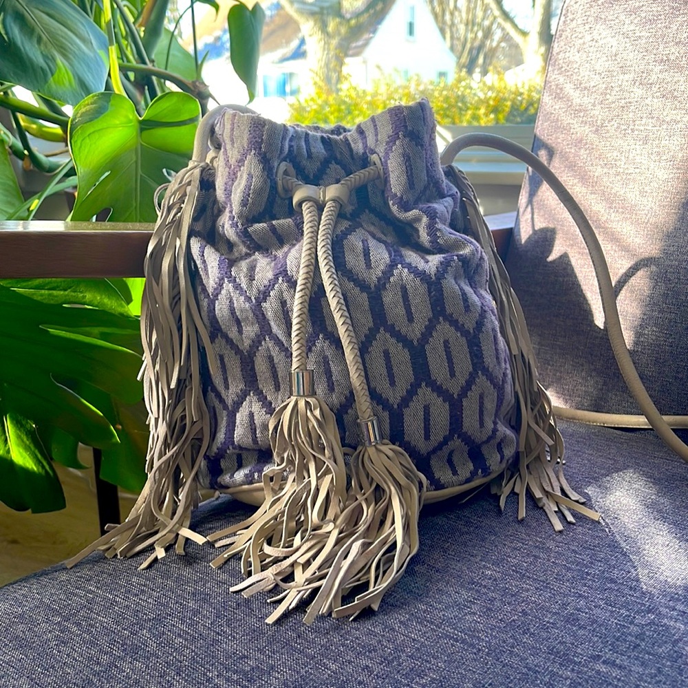 Geometric print Sam Edelman cross body bag with leather tassels